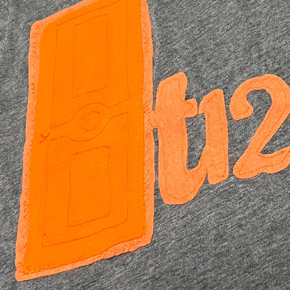 
                      
                        Kid's T12 Tee
                      
                    